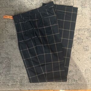 This is a men dress pants in a size 34R.